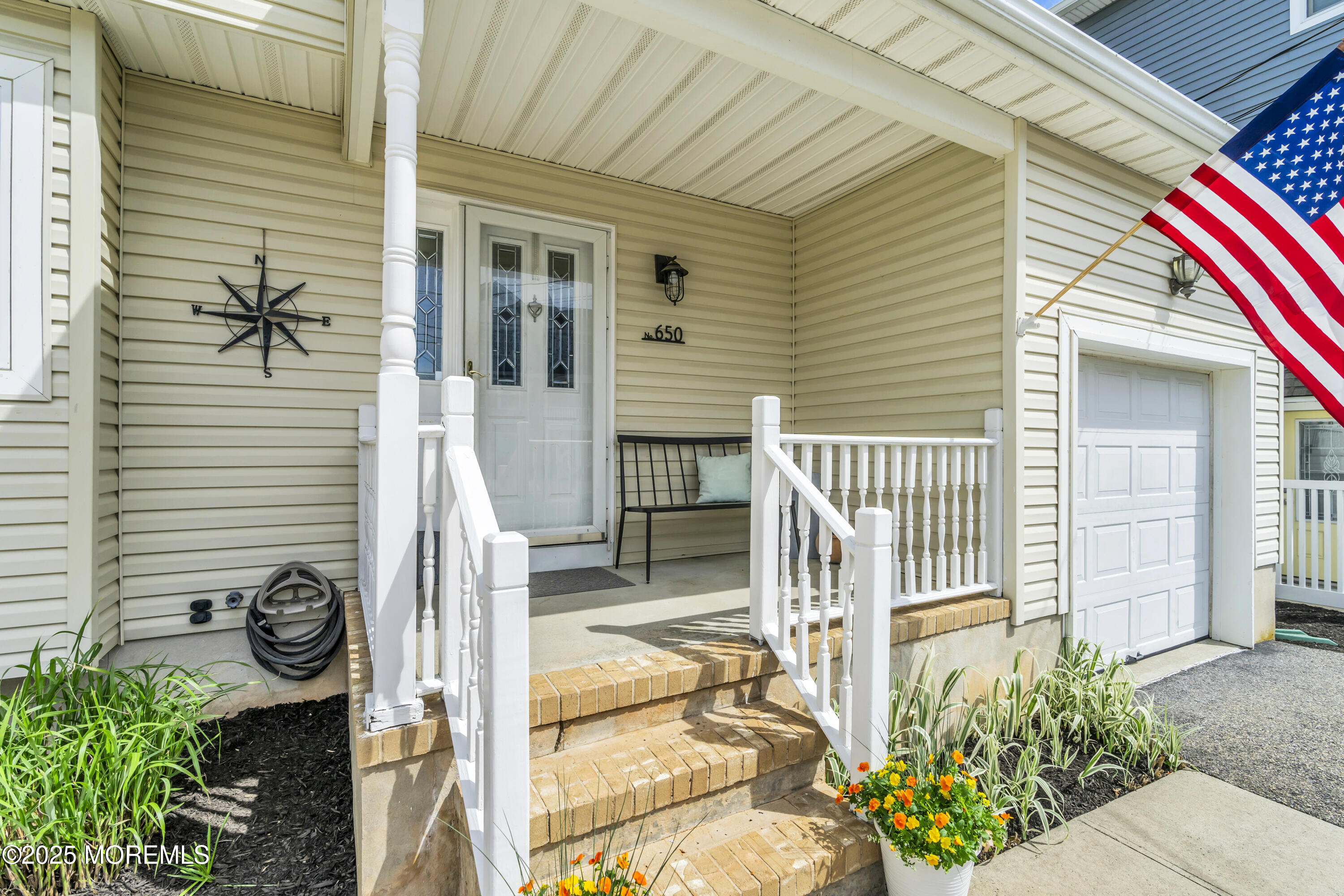 650 Drum Point Road Brick, NJ 08723 - Photo 5 of 42 a front view of a house with a balcony