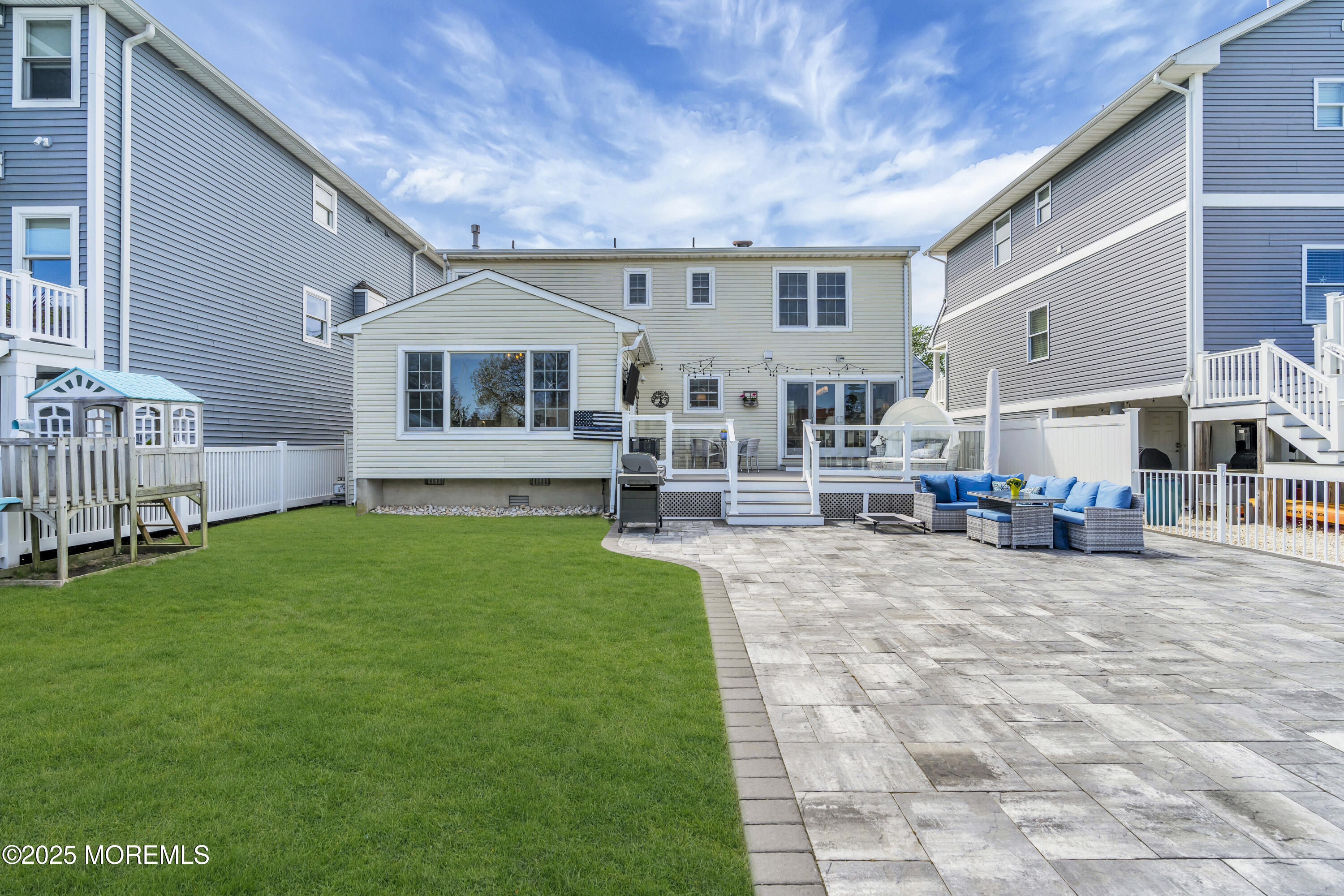 650 Drum Point Road Brick, NJ 08723 - Photo 10 of 42 a view of house with yard and deck
