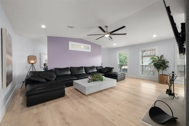 a view of an entryway with wooden floor and door