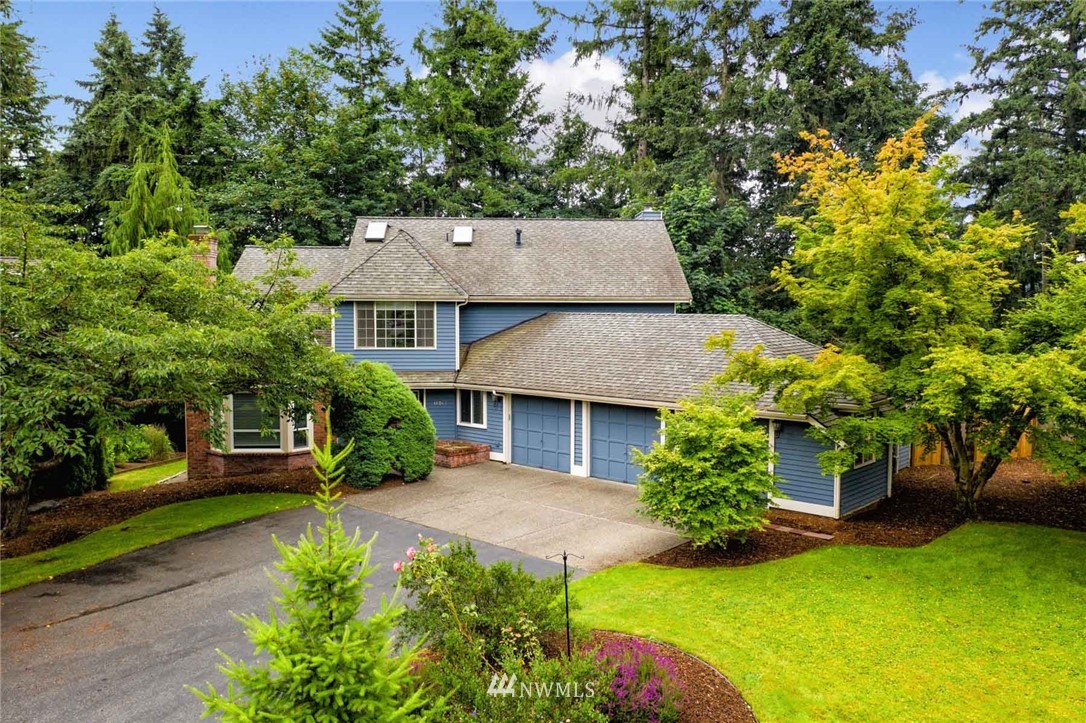 16045 Southeast 149th Street Renton, WA 98059 - Photo 1 of 39 a aerial view of a house with a yard table and chairs