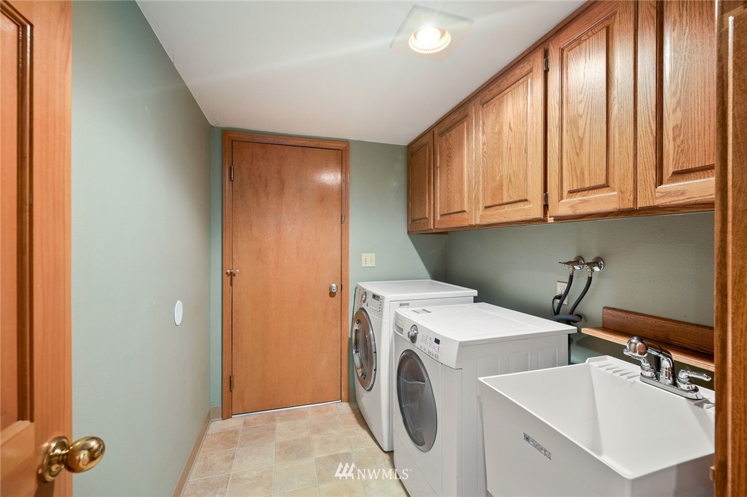 16045 Southeast 149th Street Renton, WA 98059 - Photo 21 of 39 a utility room with dryer and washer