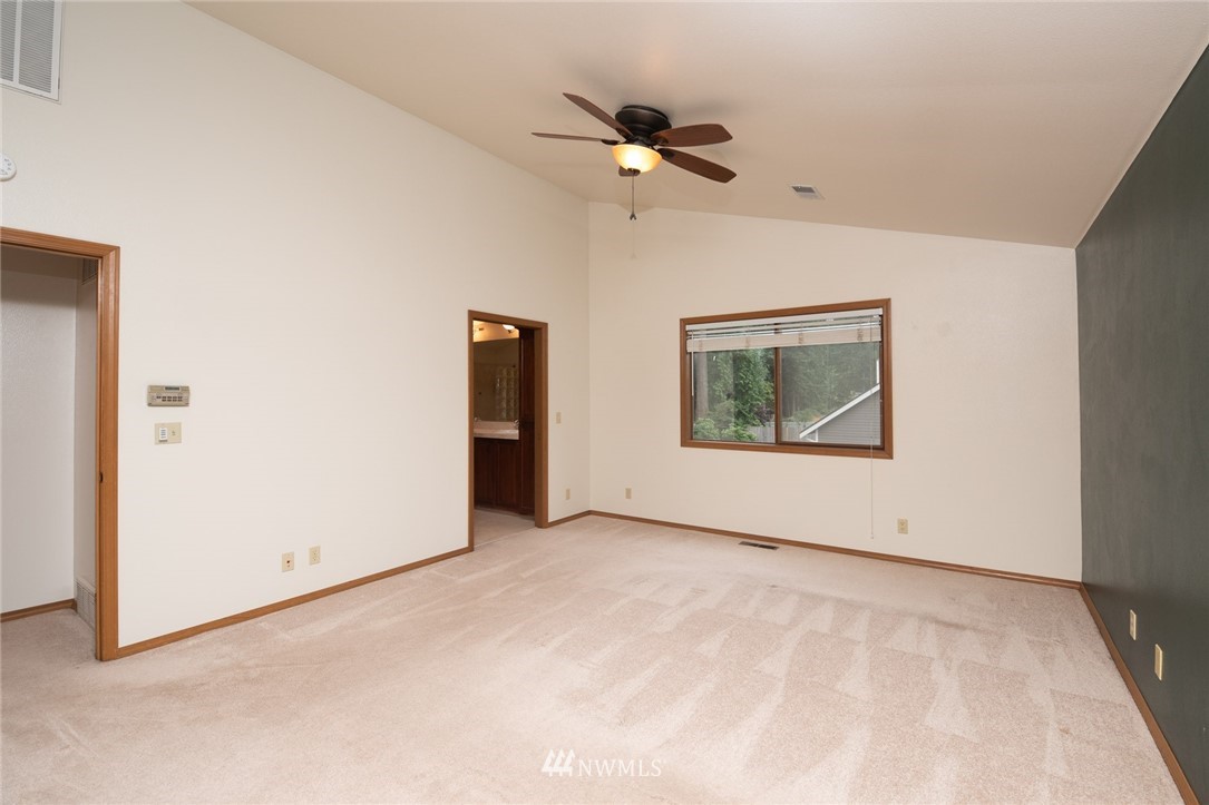 16045 Southeast 149th Street Renton, WA 98059 - Photo 25 of 39 a view of an empty room with a window