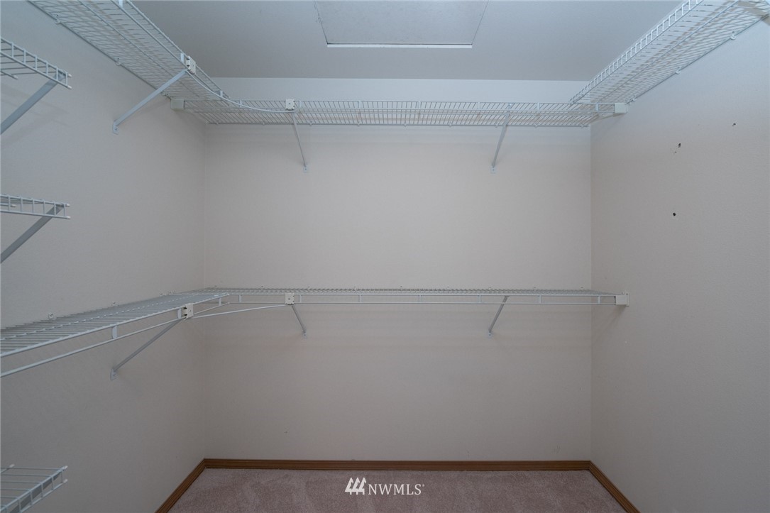 16045 Southeast 149th Street Renton, WA 98059 - Photo 30 of 39 a view of a room with racks on the wall