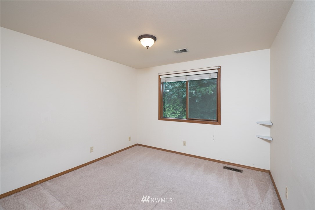 16045 Southeast 149th Street Renton, WA 98059 - Photo 34 of 39 an empty room with a window