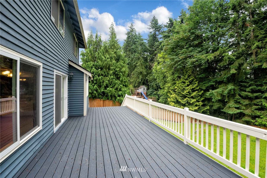 16045 Southeast 149th Street Renton, WA 98059 - Photo 37 of 39 a view of balcony with wooden floor and fence