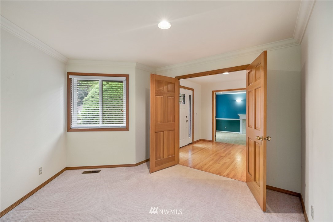16045 Southeast 149th Street Renton, WA 98059 - Photo 5 of 39 an empty room with windows and closet
