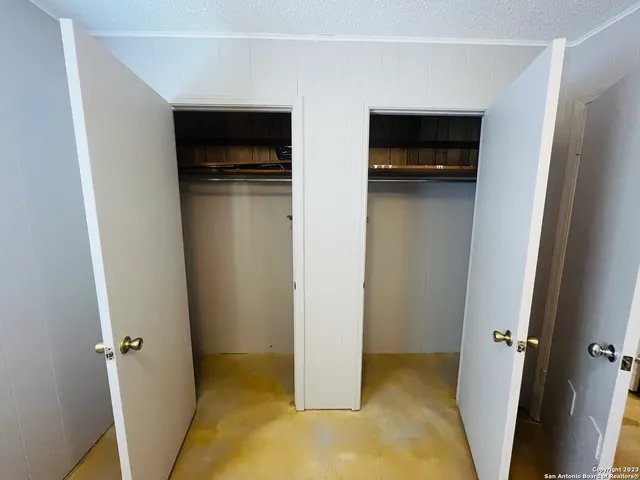 a view of a storage & utility room with washer and dryer