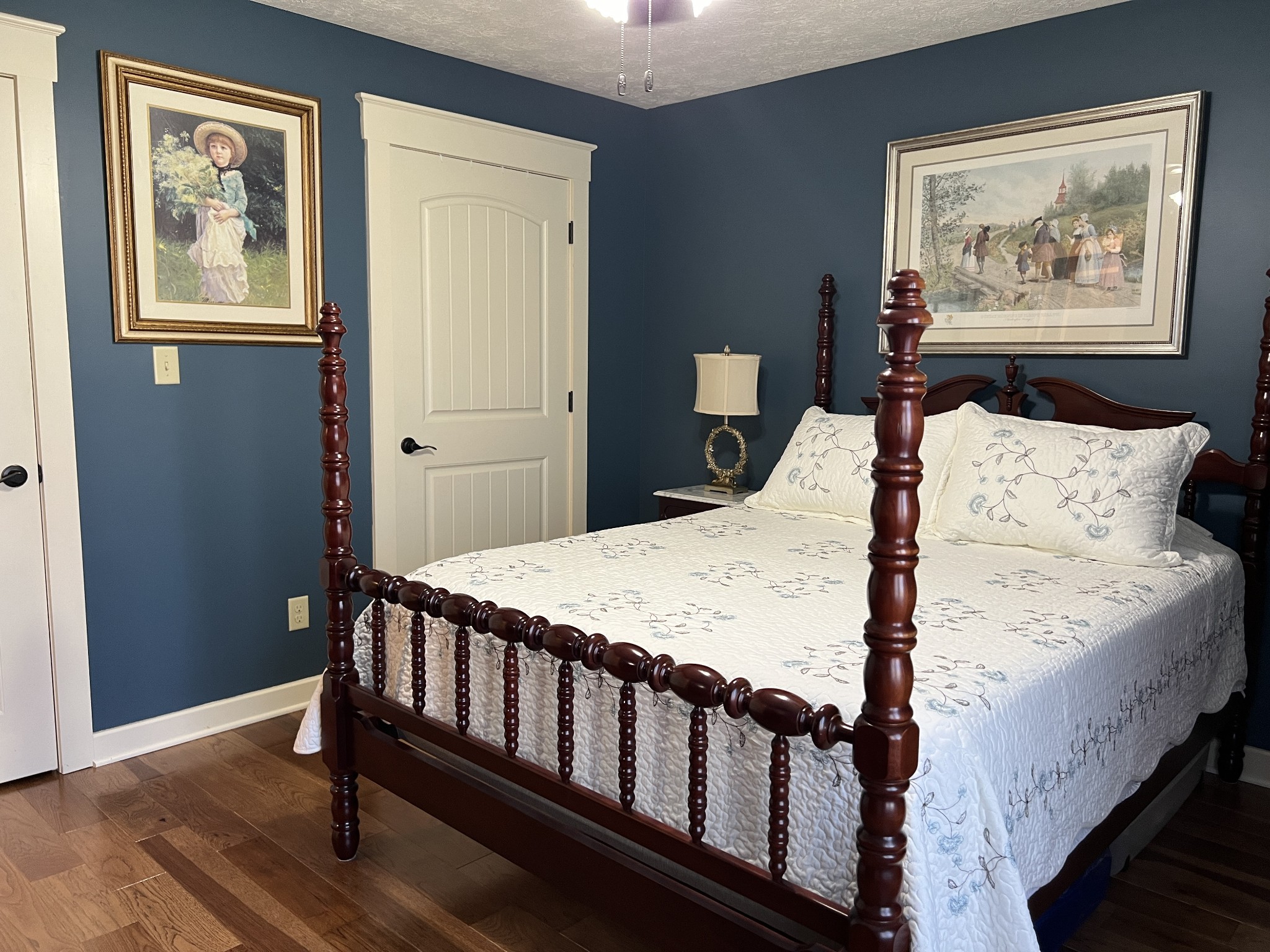 425 Alvaton- Greenhill Road Bowling Green, KY 42103 - Photo 21 of 68 a bed sitting in a bedroom next to a small bathroom