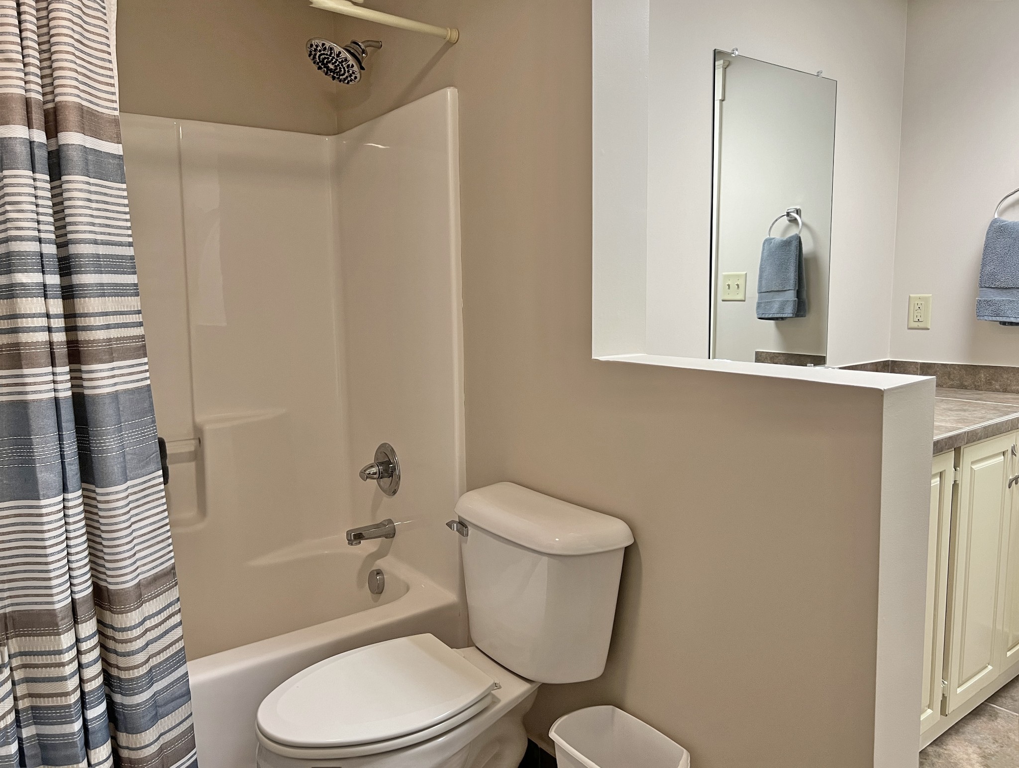 425 Alvaton- Greenhill Road Bowling Green, KY 42103 - Photo 35 of 68 a white toilet sitting next to a bathroom sink