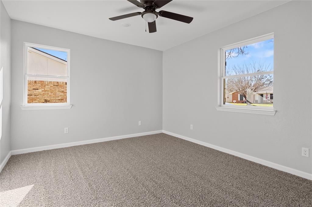 2602 Taylor Street Commerce, TX 75428 - Photo 28 of 37 a view of an empty room with a window