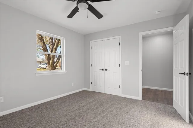 a view of empty room with windows