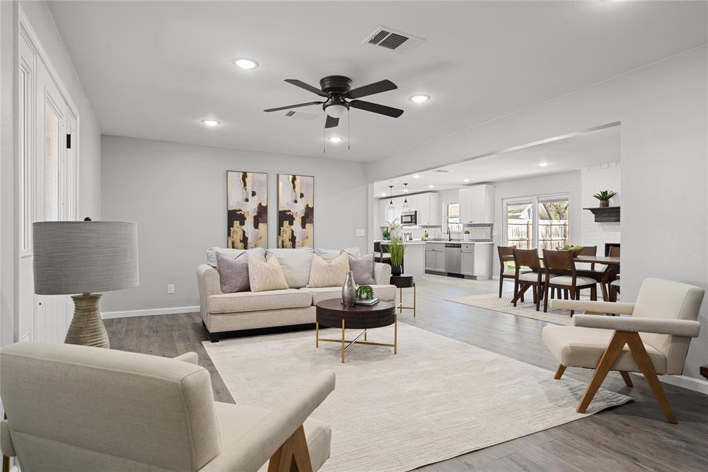 2602 Taylor Street Commerce, TX 75428 - Photo 6 of 37 a living room with furniture and wooden floor