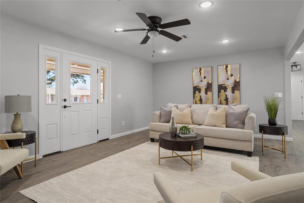 2602 Taylor Street Commerce, TX 75428 - Photo 7 of 37 a living room with furniture and a ceiling fan