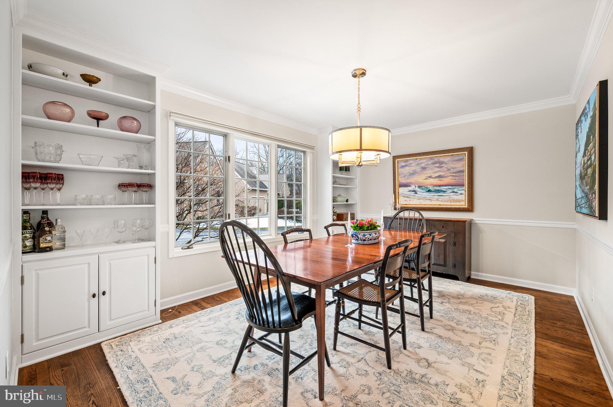 313 Heritage Place Devon, PA 19333 - Photo 11 of 44 a view of a dining room with furniture window and wooden floor