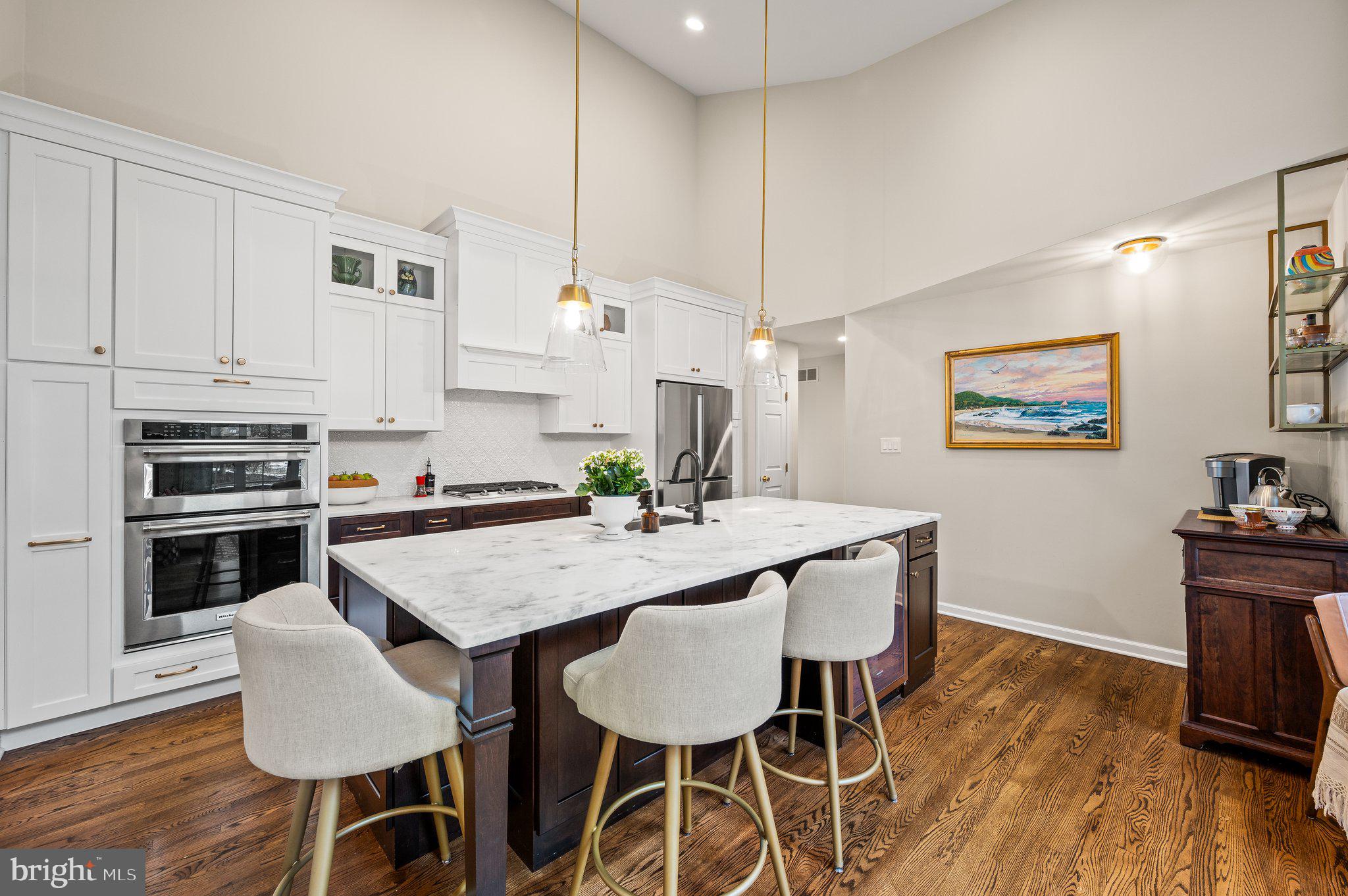 313 Heritage Place Devon, PA 19333 - Photo 14 of 44 a view of kitchen with cabinets table and chairs