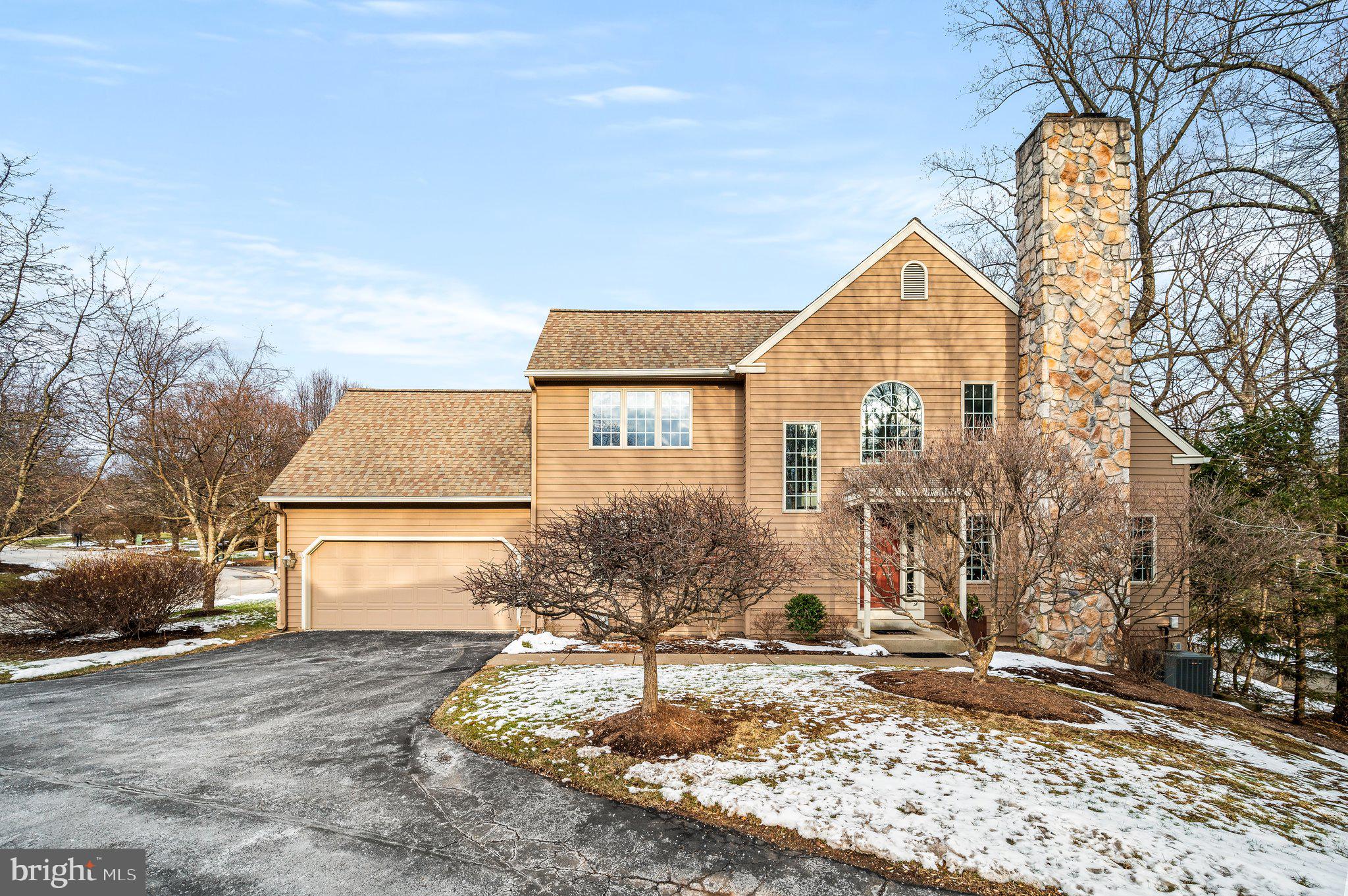 313 Heritage Place Devon, PA 19333 - Photo 2 of 44 a view of a street with a house in the background