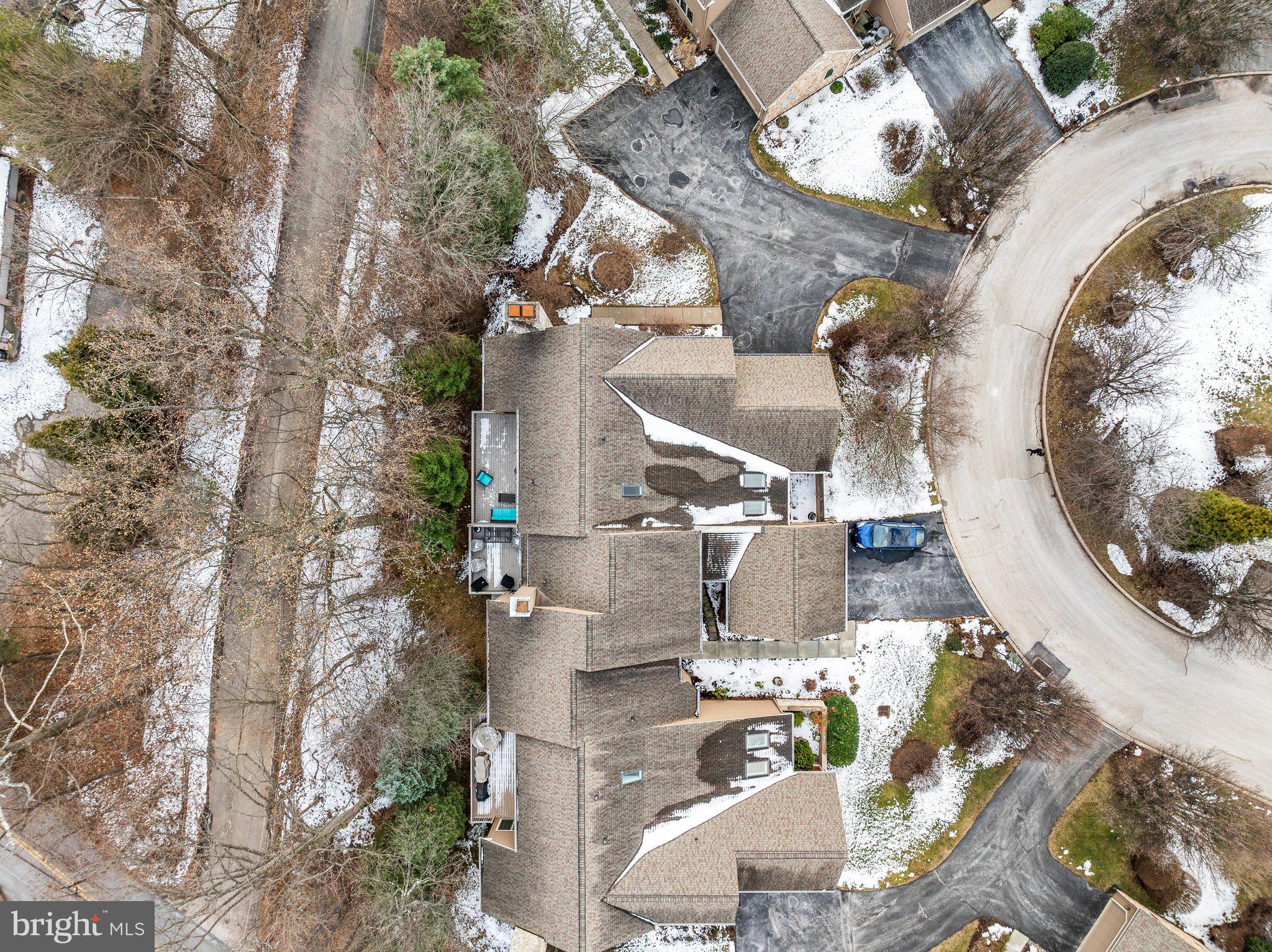 313 Heritage Place Devon, PA 19333 - Photo 38 of 44 an aerial view of a house with a swimming pool