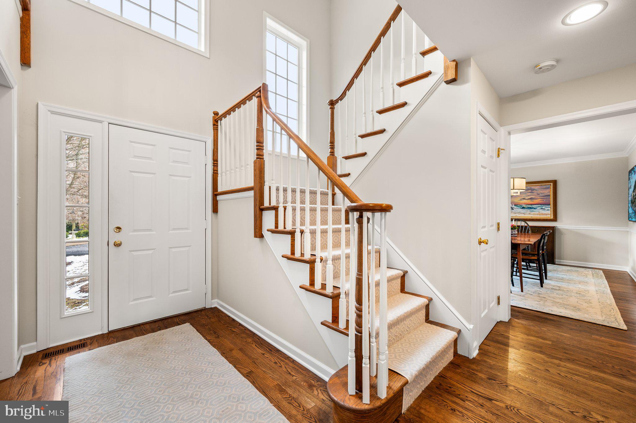 313 Heritage Place Devon, PA 19333 - Photo 9 of 44 a view of entryway and hall with wooden floor
