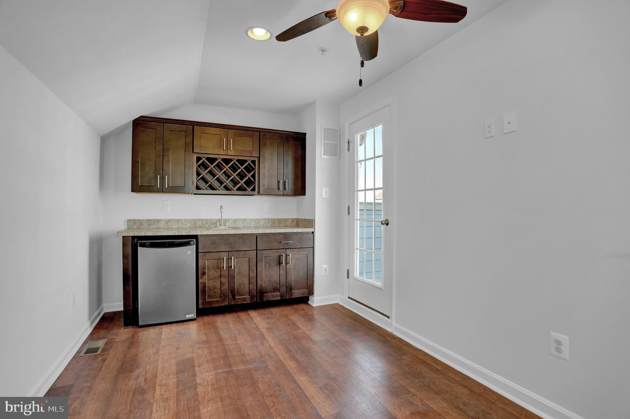 2035 Case Road Dundalk, MD 21222 - Photo 21 of 38 Top floor loft with wet bar/mini fridge