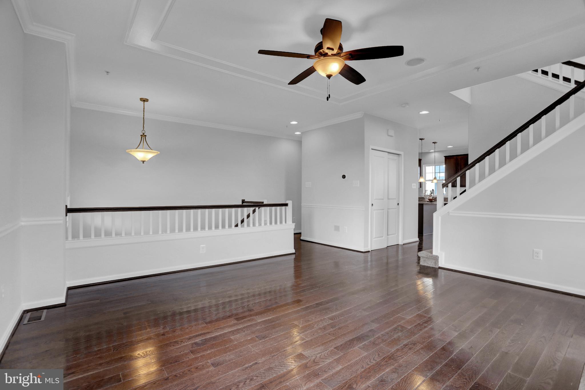 2035 Case Road Dundalk, MD 21222 - Photo 3 of 38 Living room w/hardwood flooring & custom moldings