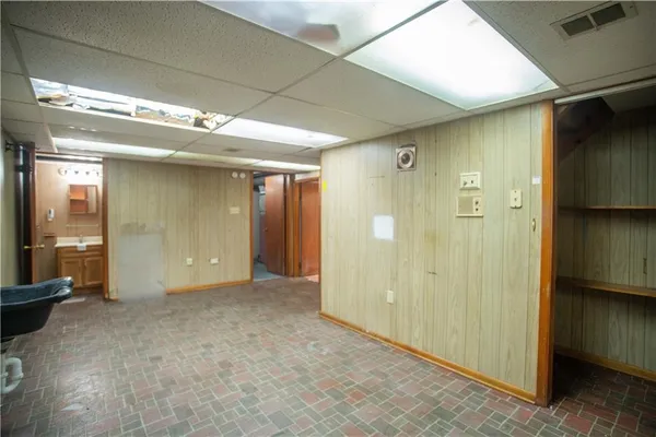 a view of bathroom with a shower and a sink