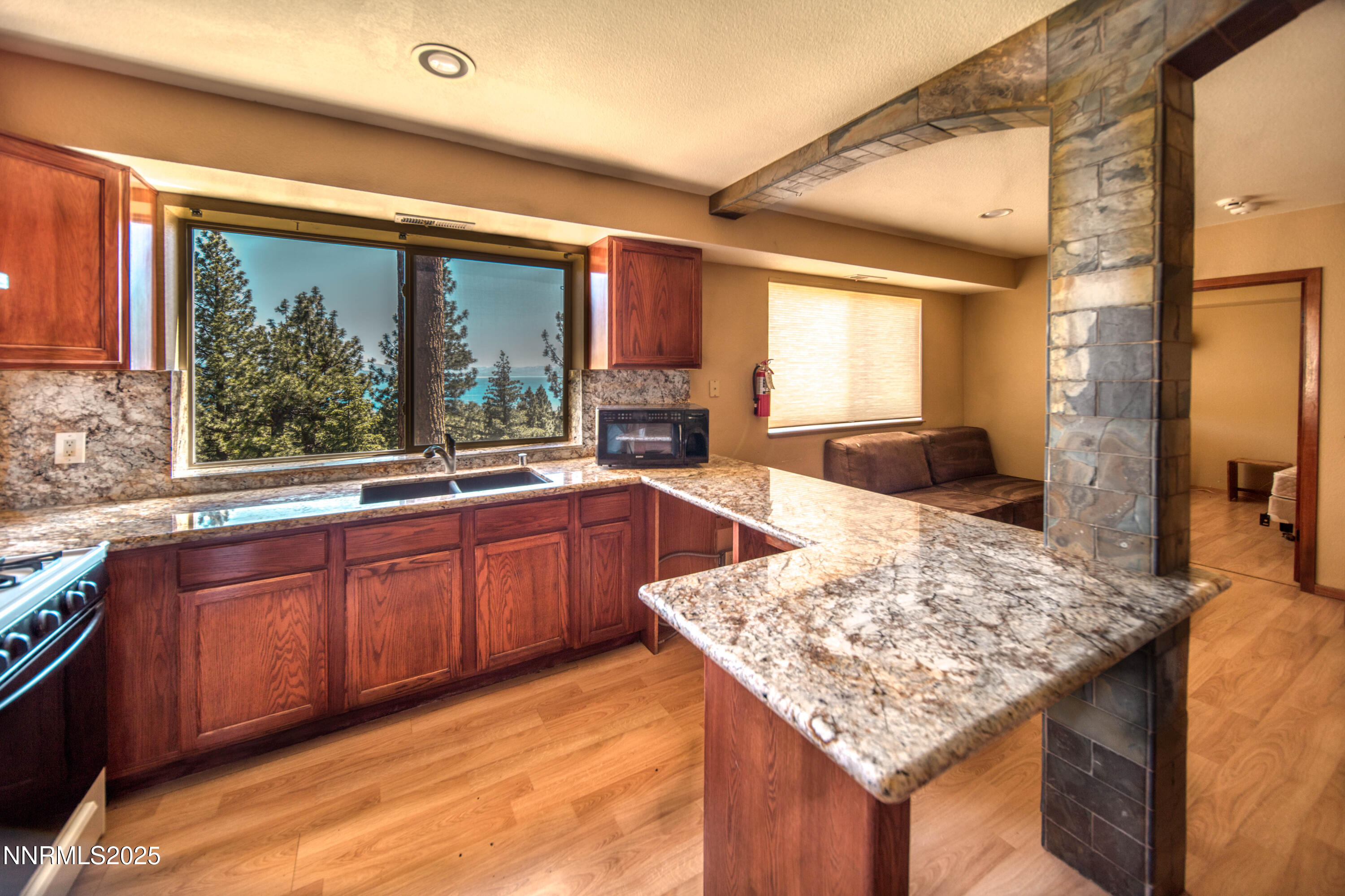 689 Tyner Way Incline Village, NV 89451 - Photo 18 of 50 a kitchen with a sink and large windows