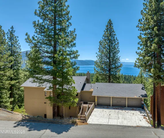 an aerial view of a house roof deck
