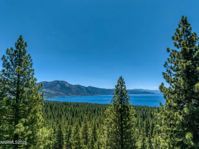 a view of a lake with a mountain in the background