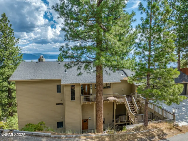 a aerial view of a house with swimming pool