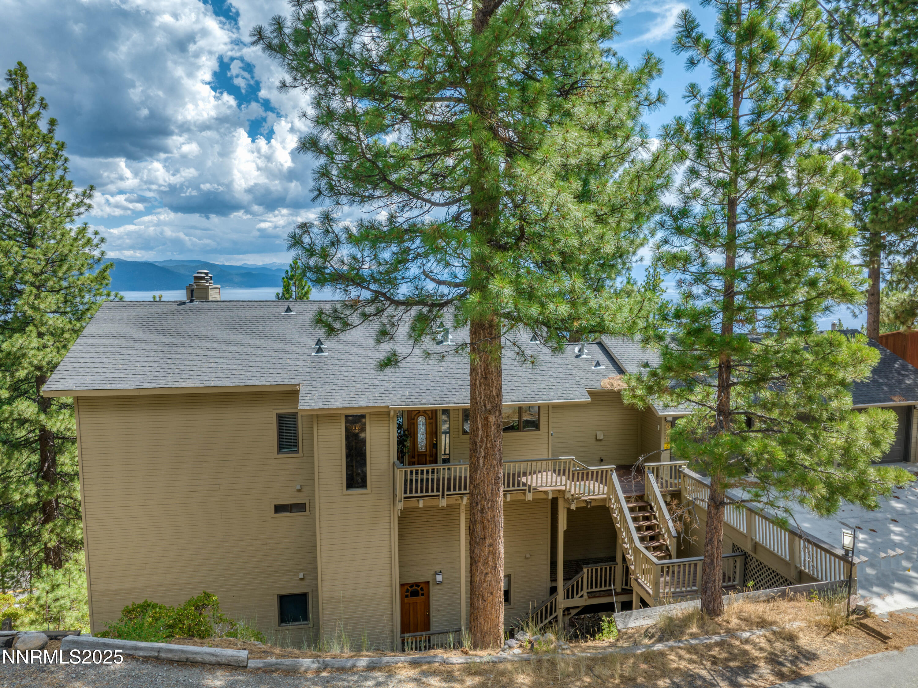 689 Tyner Way Incline Village, NV 89451 - Photo 3 of 50 a aerial view of a house with swimming pool
