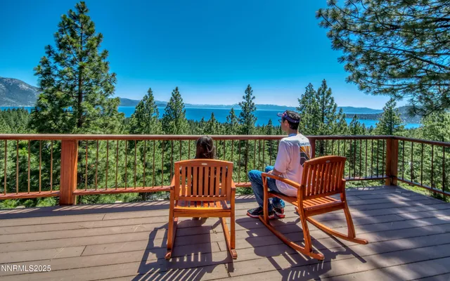 a view of roof deck with furniture