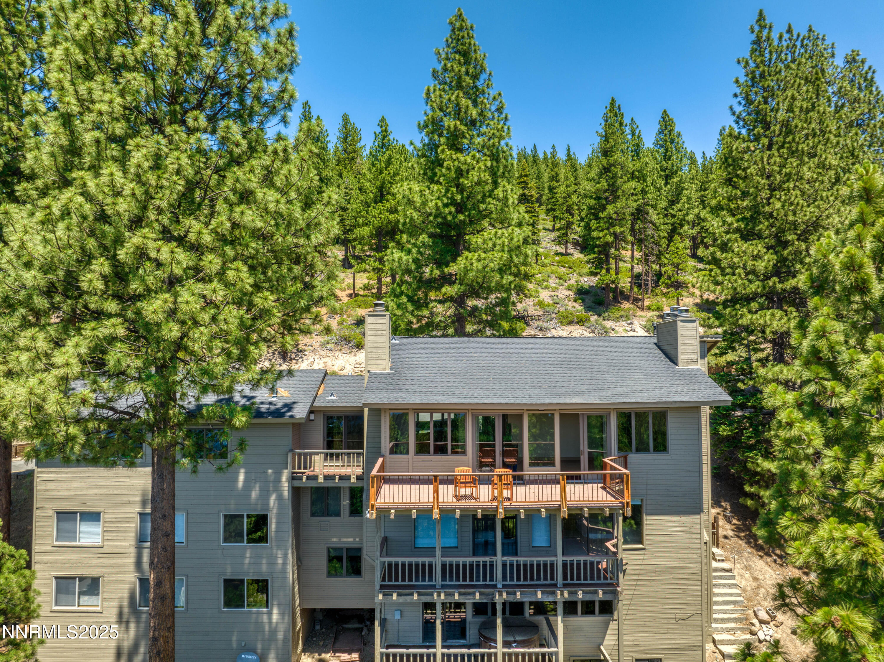 689 Tyner Way Incline Village, NV 89451 - Photo 7 of 50 a front view of a house with a garden