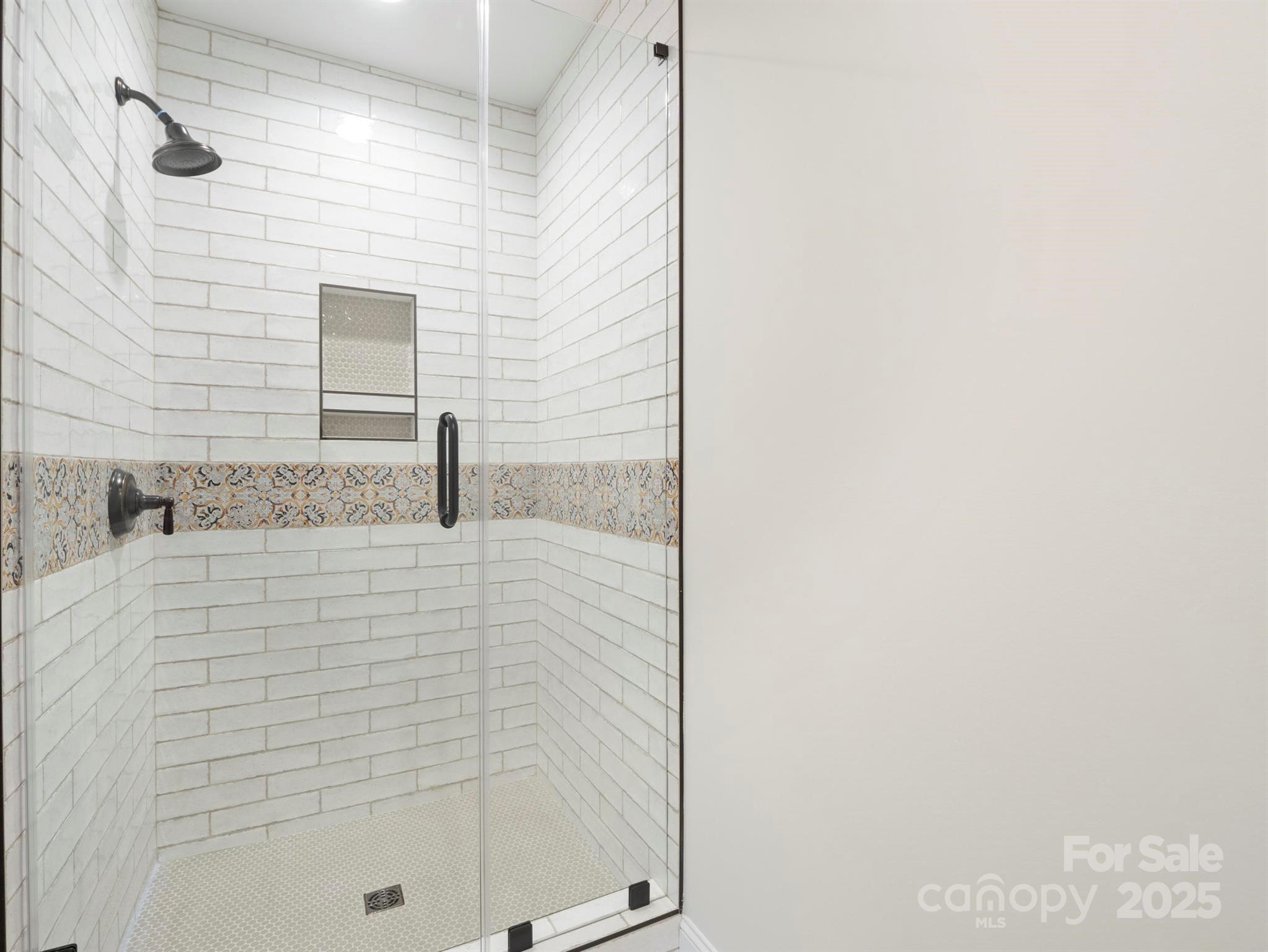 100 Gilbert Road Columbus, NC 28722 - Photo 16 of 24 a bathroom with a shower