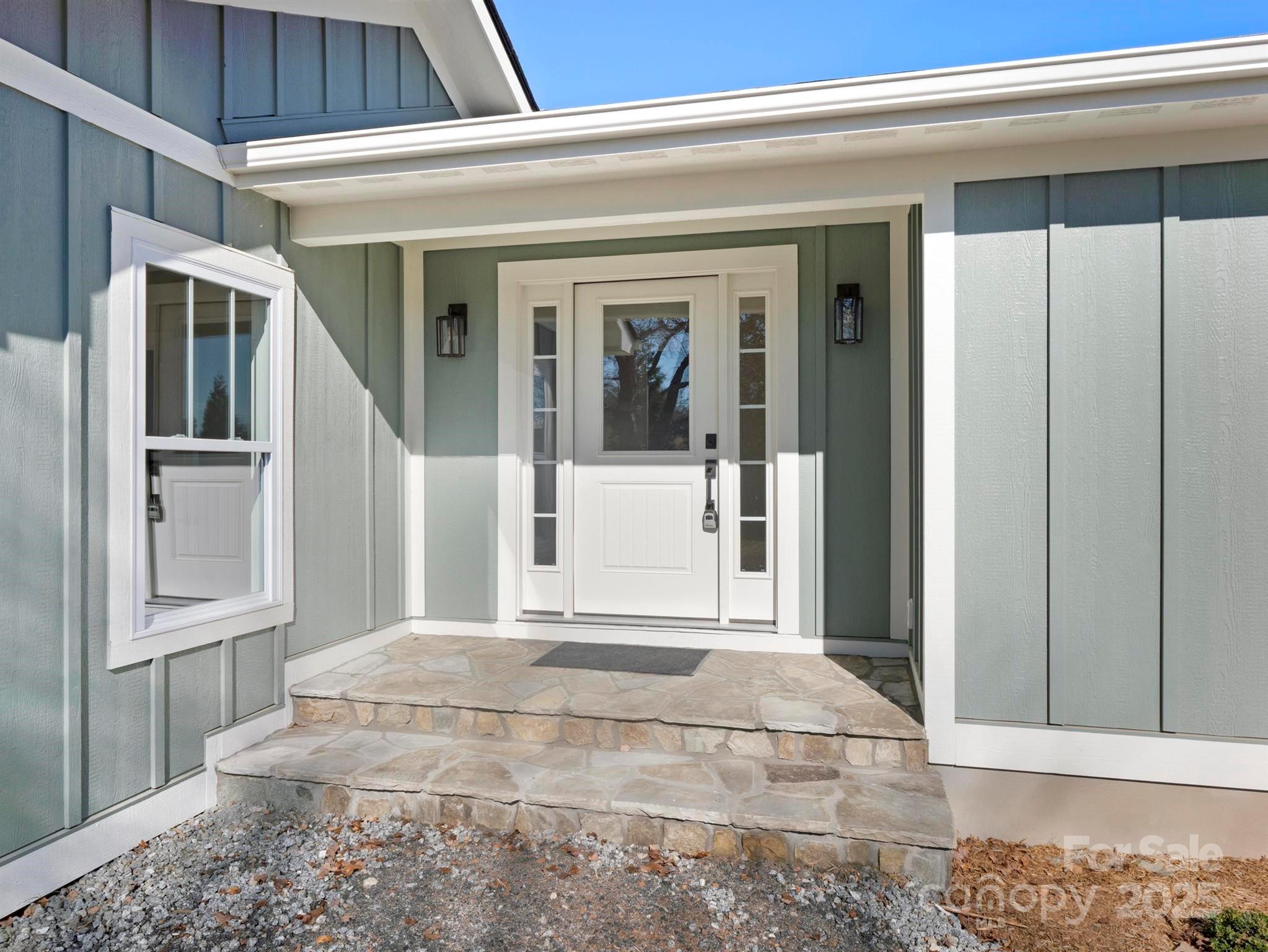 100 Gilbert Road Columbus, NC 28722 - Photo 4 of 24 a view of a entryway of the house