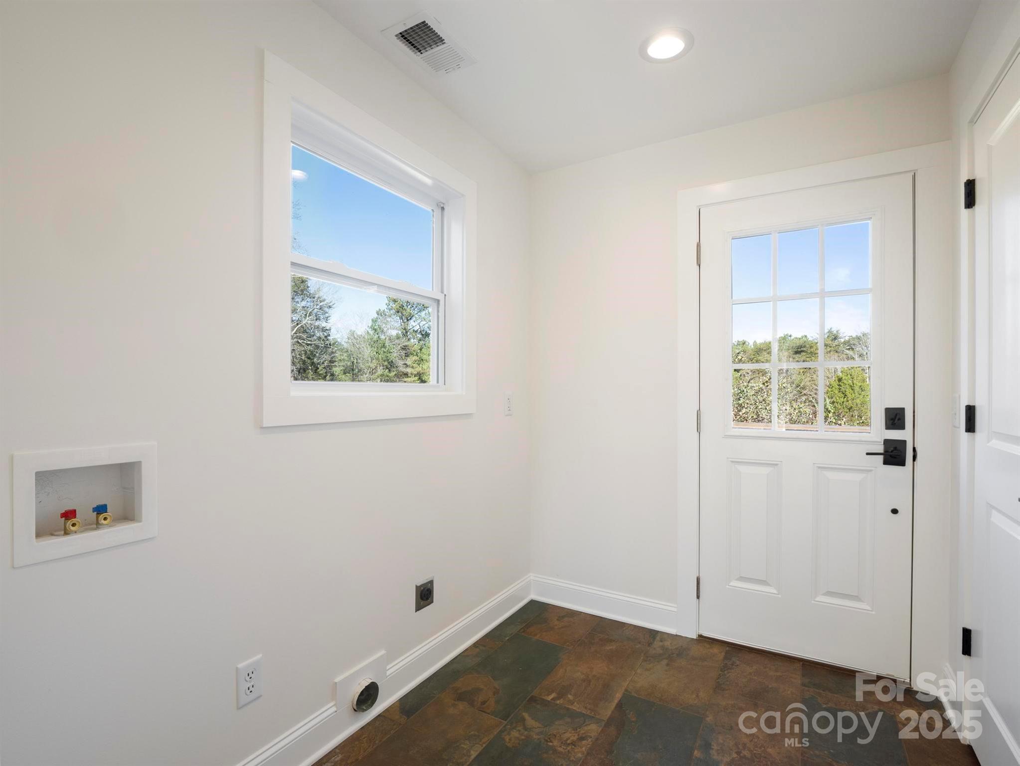 100 Gilbert Road Columbus, NC 28722 - Photo 9 of 24 an empty room with window