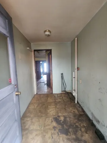 a view of a room with a fireplace