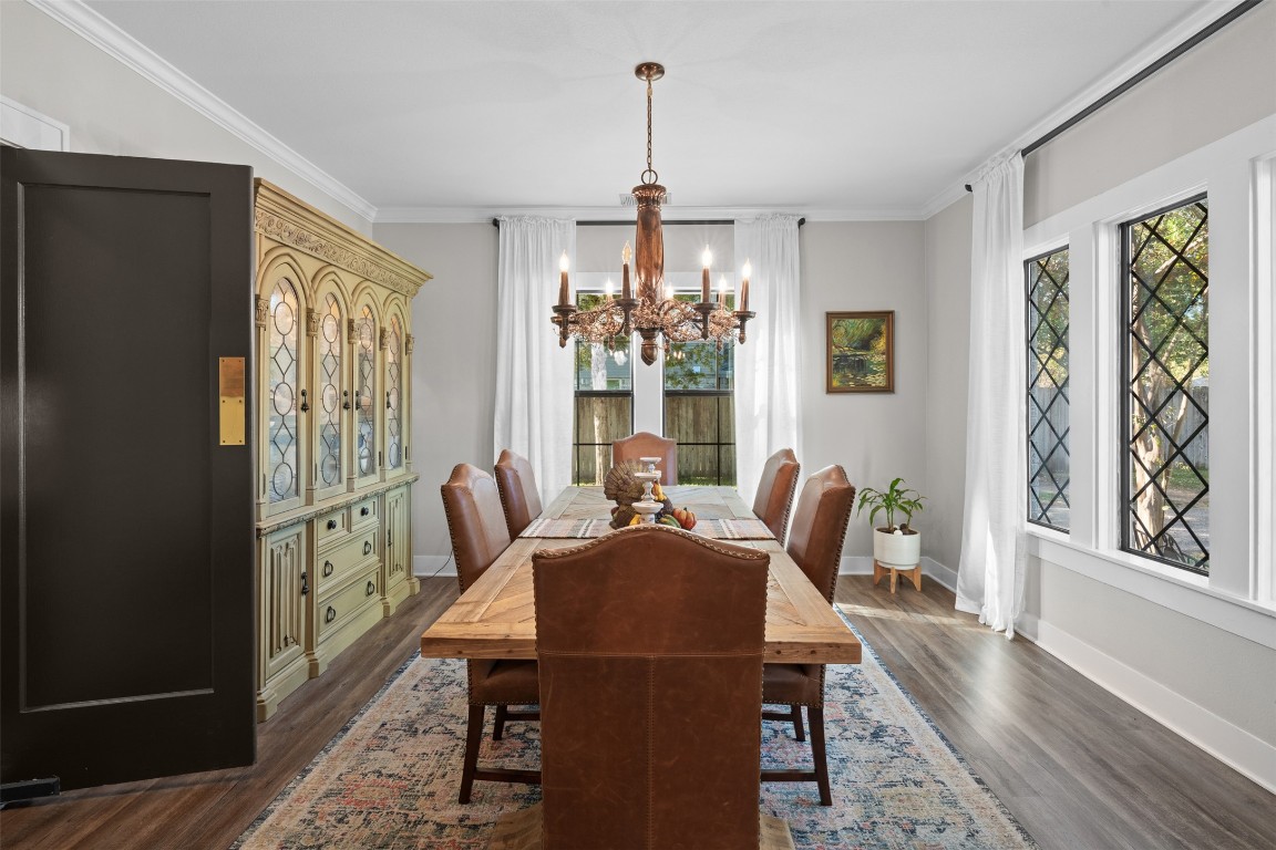 1005 East 14th Street Cameron, TX 76520 - Photo 12 of 40 a view of a dining room with furniture window and wooden floor