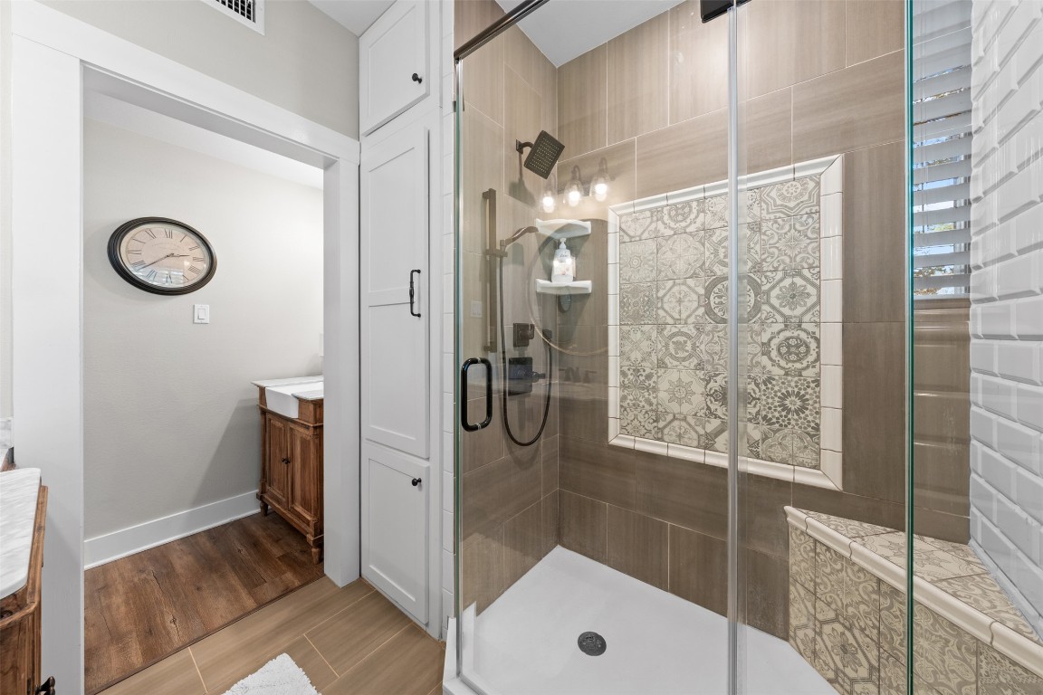 1005 East 14th Street Cameron, TX 76520 - Photo 28 of 40 a bathroom with a shower and a sink