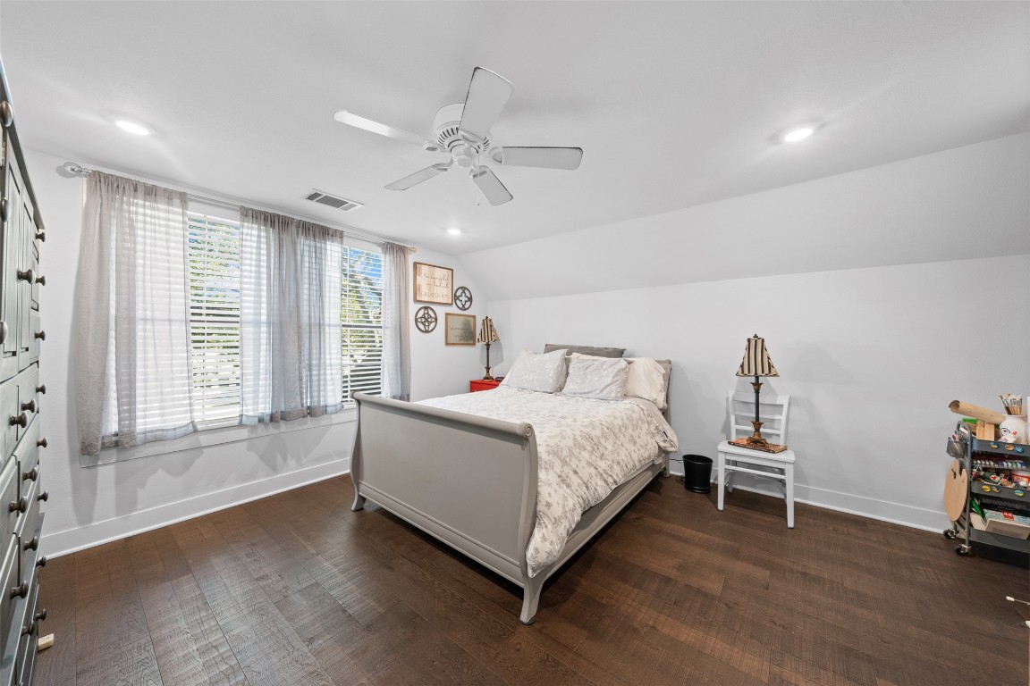 1005 East 14th Street Cameron, TX 76520 - Photo 32 of 40 a spacious bedroom with a bed and a window