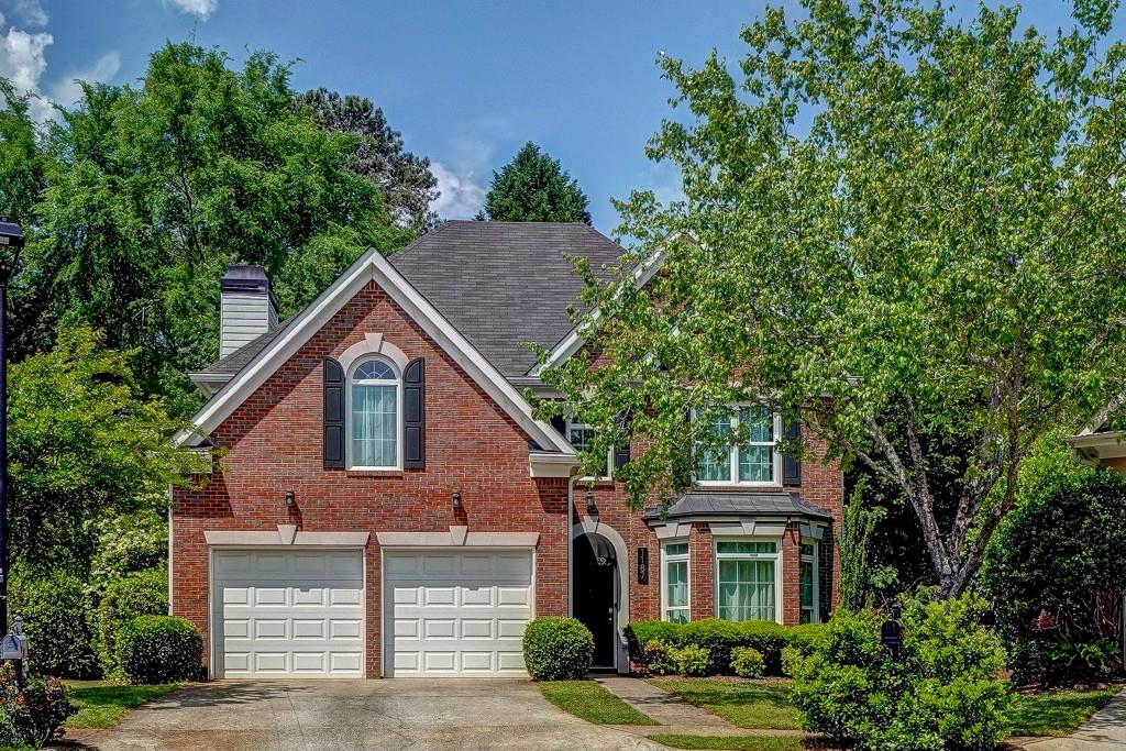 1187 Druid Walk Decatur, GA 30033 - Photo 1 of 1 a front view of a house with a garden