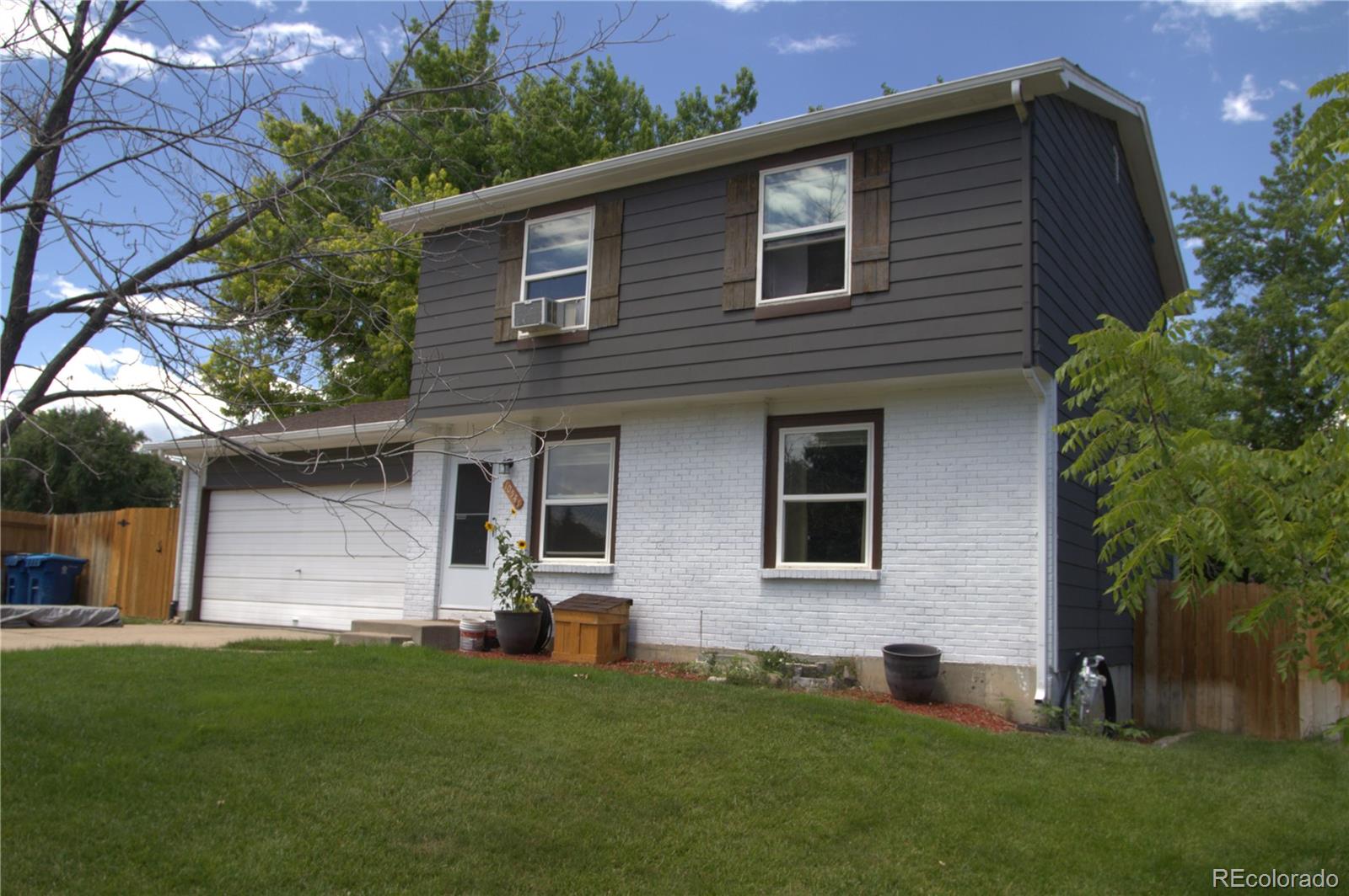 a front view of house with yard