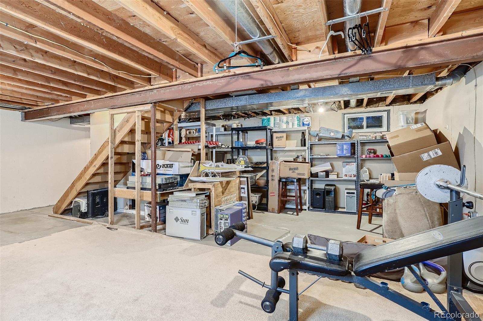 10541 Routt Street Westminster, CO 80021 - Photo 18 of 26 a view of a room with gym equipment
