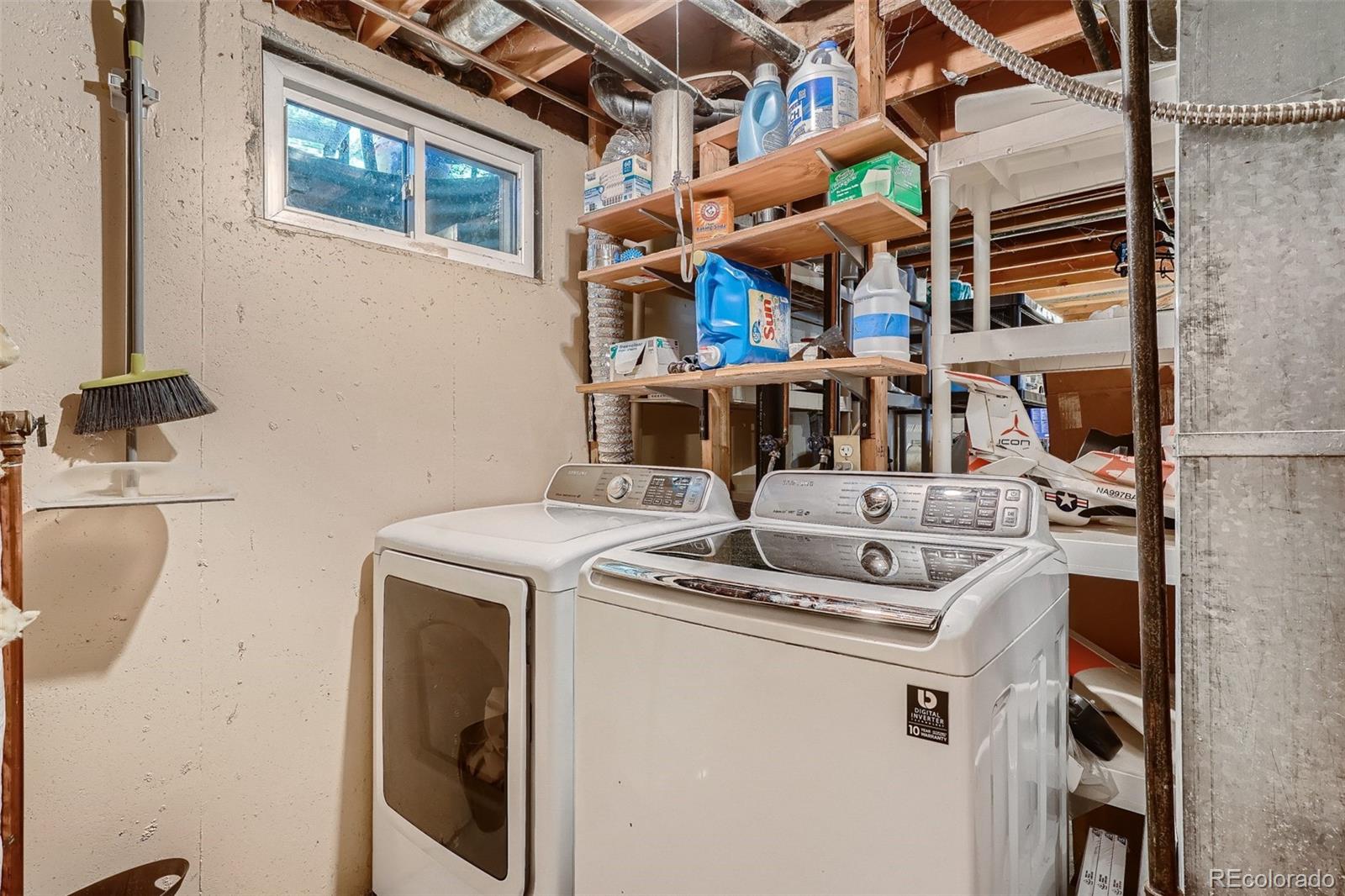 10541 Routt Street Westminster, CO 80021 - Photo 19 of 26 a utility room with dryer and washer