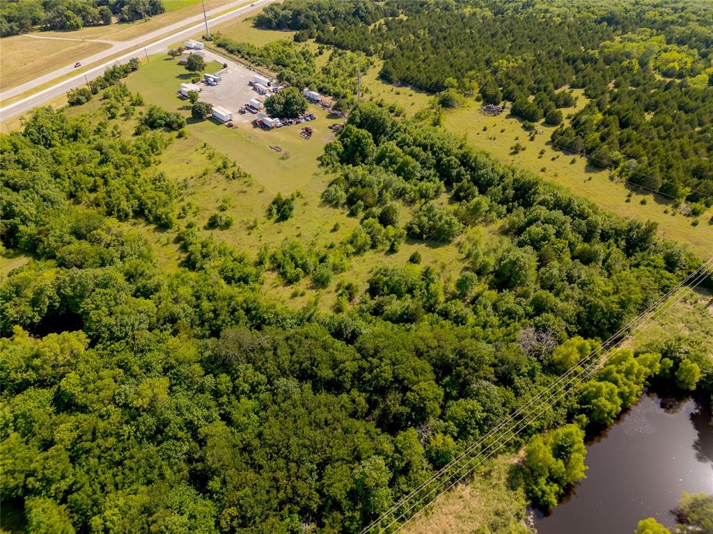 121 Sam Rayburn Highway Anna, TX 75409 - Photo 12 of 18 a view of a yard with a plant