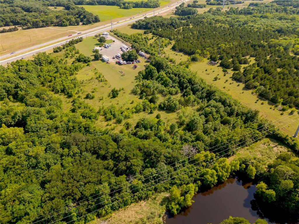 121 Sam Rayburn Highway Anna, TX 75409 - Photo 15 of 18 a view of a garden with a plant