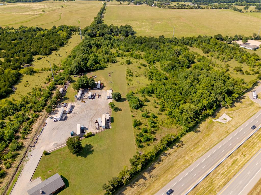 121 Sam Rayburn Highway Anna, TX 75409 - Photo 18 of 18 an aerial view of residential houses with outdoor space
