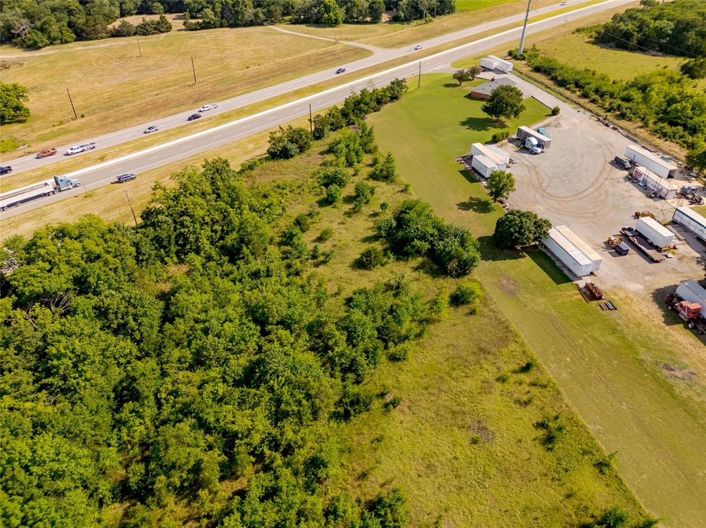 121 Sam Rayburn Highway Anna, TX 75409 - Photo 5 of 18 a view of a yard with an outdoor space