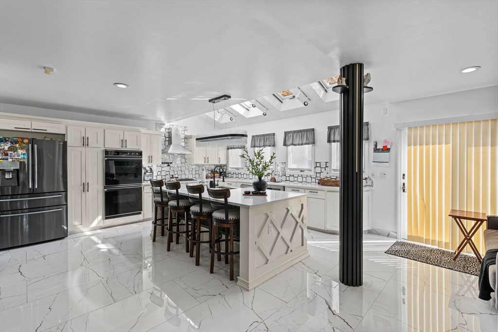 499 Madison Street Fall River, MA 02720 - Photo 11 of 38 a view of a dining room with furniture