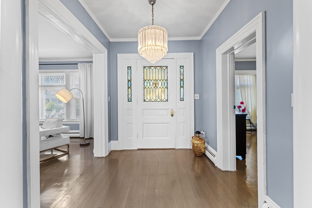 499 Madison Street Fall River, MA 02720 - Photo 21 of 38 a view of entryway with wooden floor