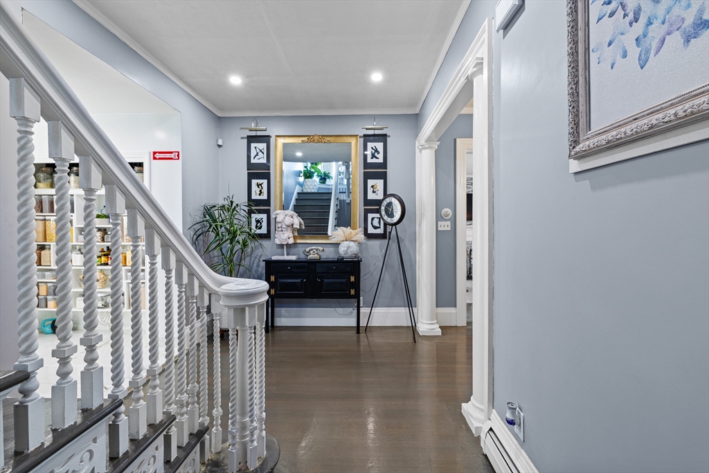 499 Madison Street Fall River, MA 02720 - Photo 22 of 38 a view of entryway livingroom and hall with wooden floor